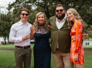 Kim Potgieter and her children in formal wear.